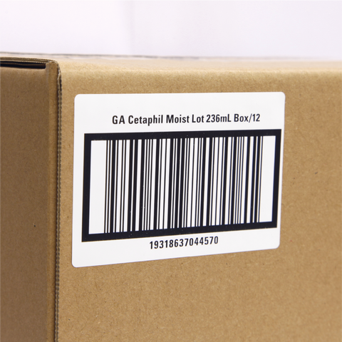 Custom printed barcode label on a cardboard box with product details.